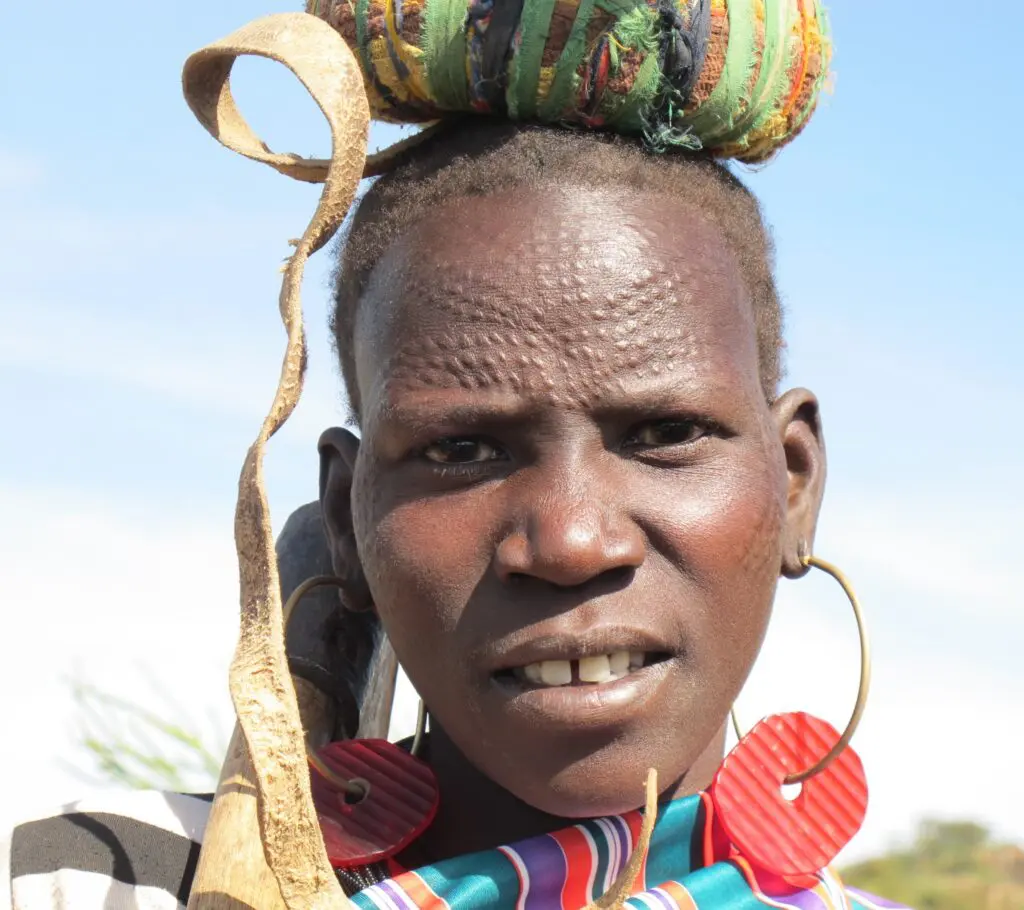 Close up portrait Karamajong women with earrings